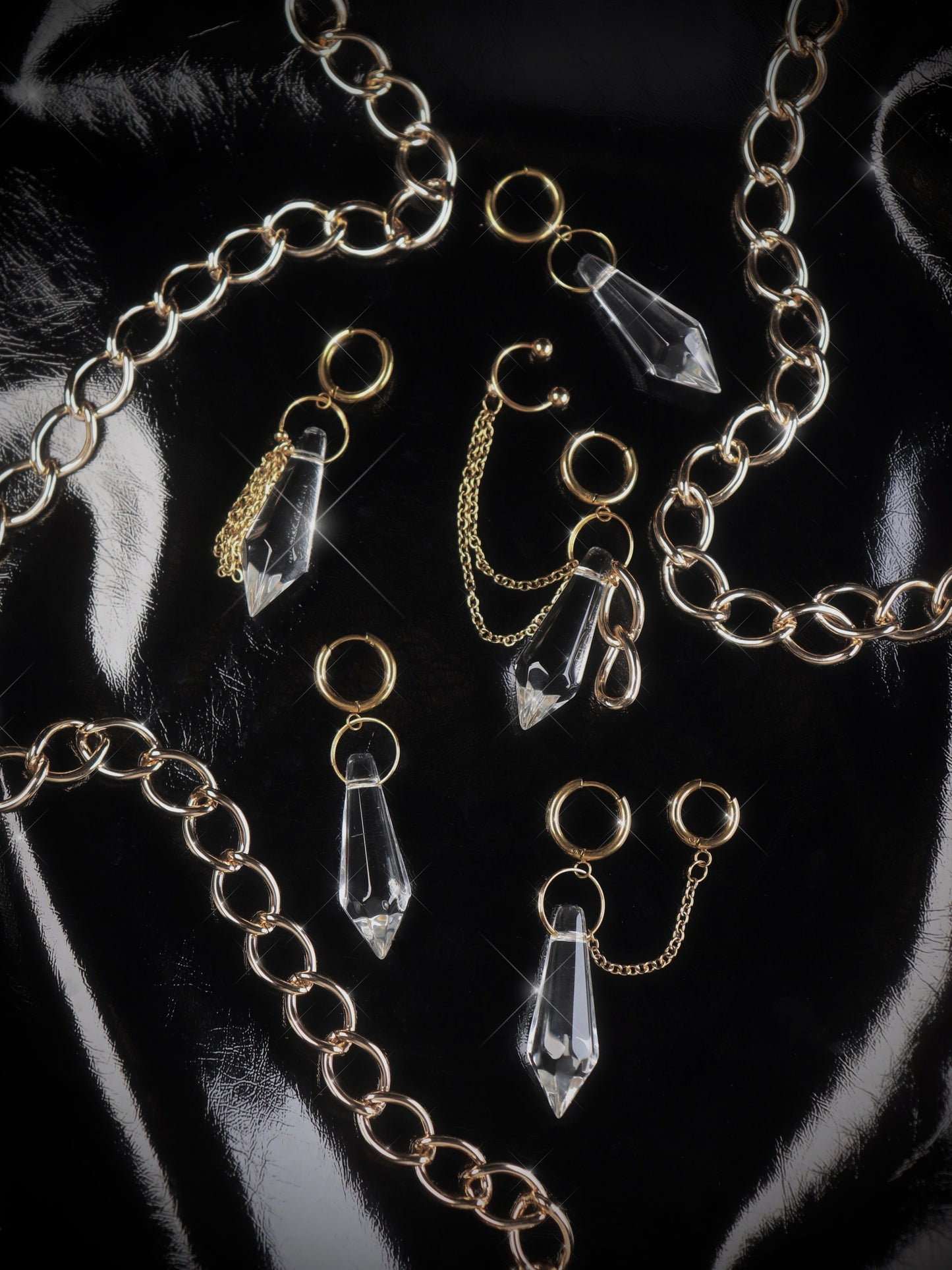 Single earring with pendant and chain tassel