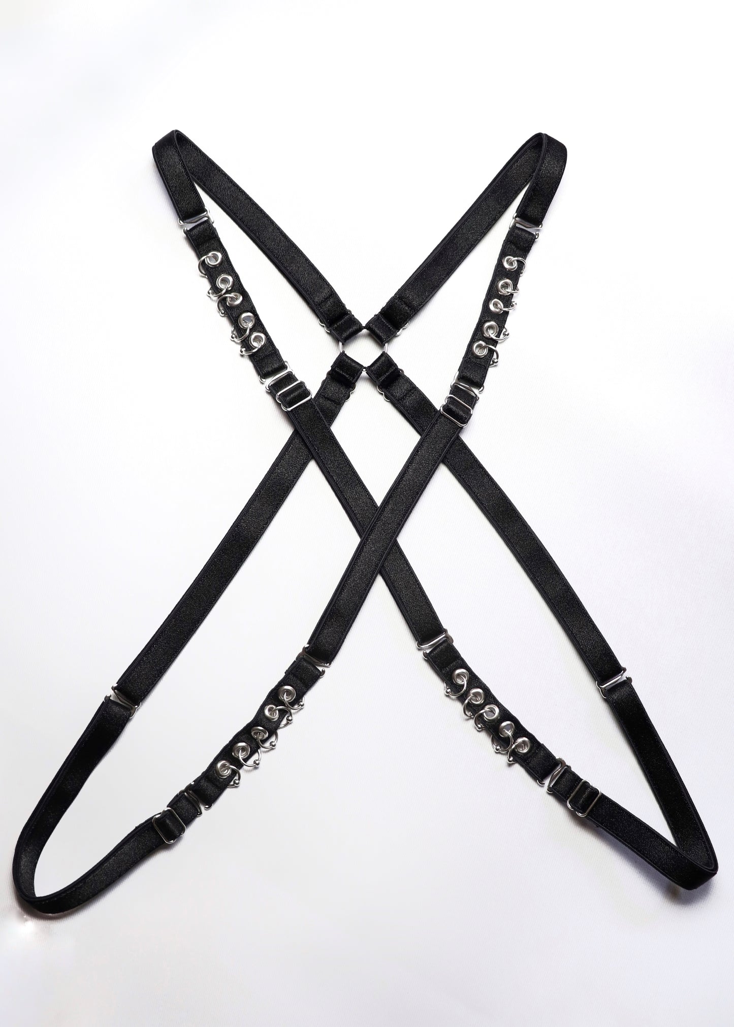 Mini multi-position harness with eyelets and piercings