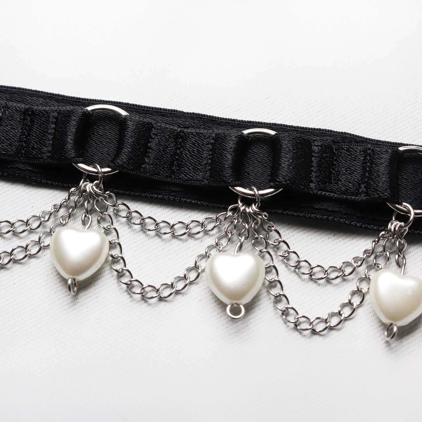 Choker with small chains and heart beads