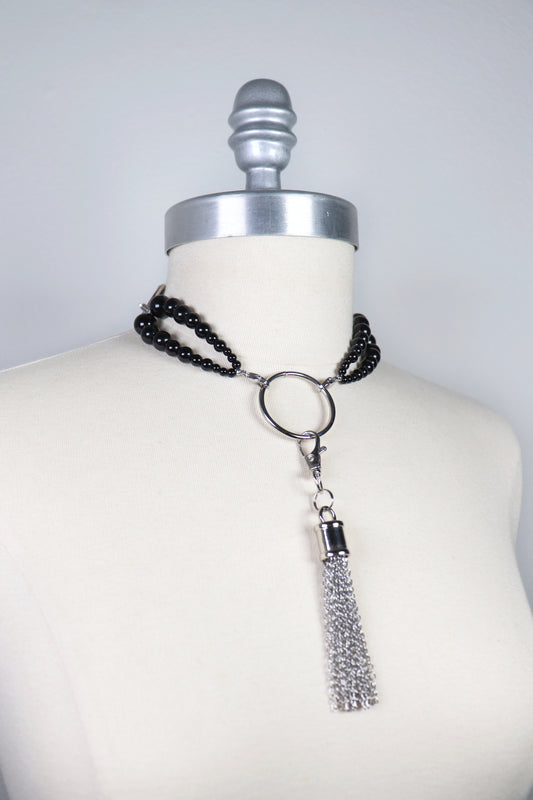 Onyx beaded necklace with O ring and chain tassel
