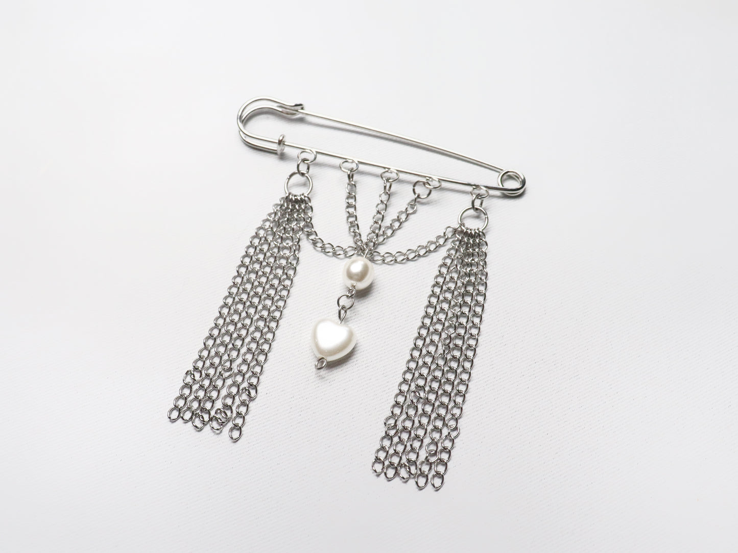 Heart chain and pearl brooch